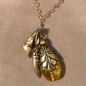 Silver necklace with amber charm